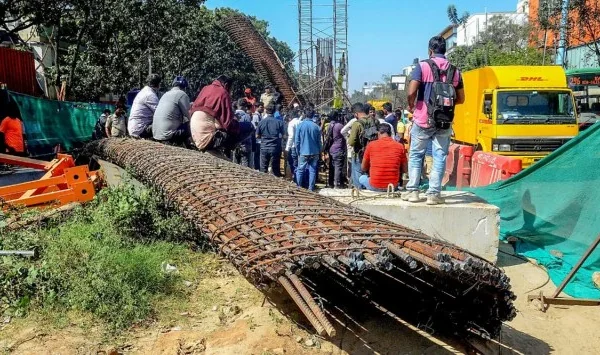 Emergency teams inspecting collapsed metro construction structure in Bengaluru