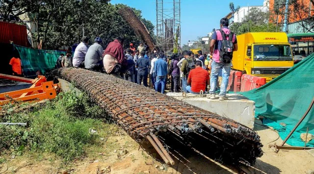Emergency teams inspecting collapsed metro construction structure in Bengaluru