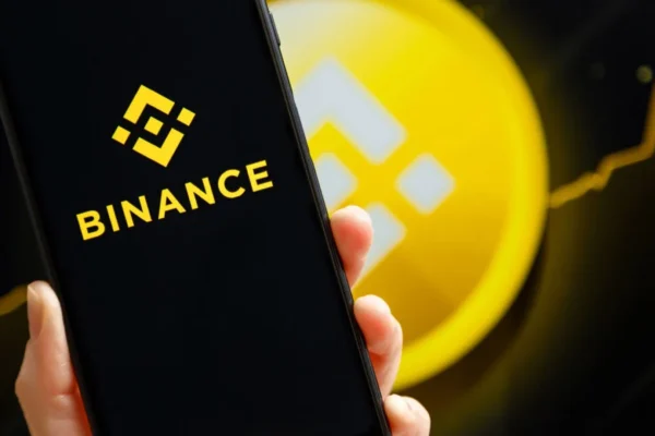 Binance cryptocurrency exchange platform interface showing trading charts and BNB price update in 2026