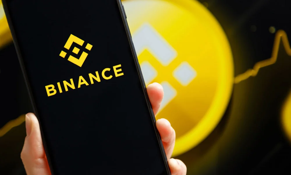 Binance cryptocurrency exchange platform interface showing trading charts and BNB price update in 2026