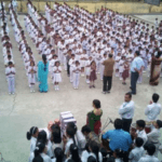 Indian school students standing in lines during morning assembly