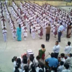 Indian school students standing in lines during morning assembly