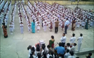 Indian school students standing in lines during morning assembly