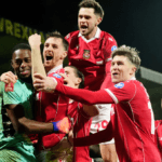 Wrexham AFC players celebrating a goal during FA Cup match