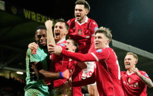 Wrexham AFC players celebrating a goal during FA Cup match