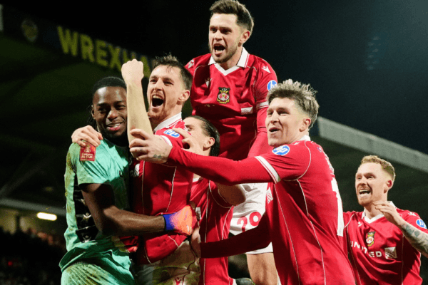 Wrexham AFC players celebrating a goal during FA Cup match
