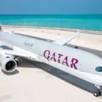 Qatar Airways aircraft parked on the runway at Hamad International Airport in Doha as flights are suspended due to national airspace closure.