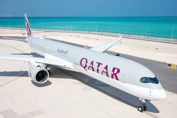 Qatar Airways aircraft parked on the runway at Hamad International Airport in Doha as flights are suspended due to national airspace closure.